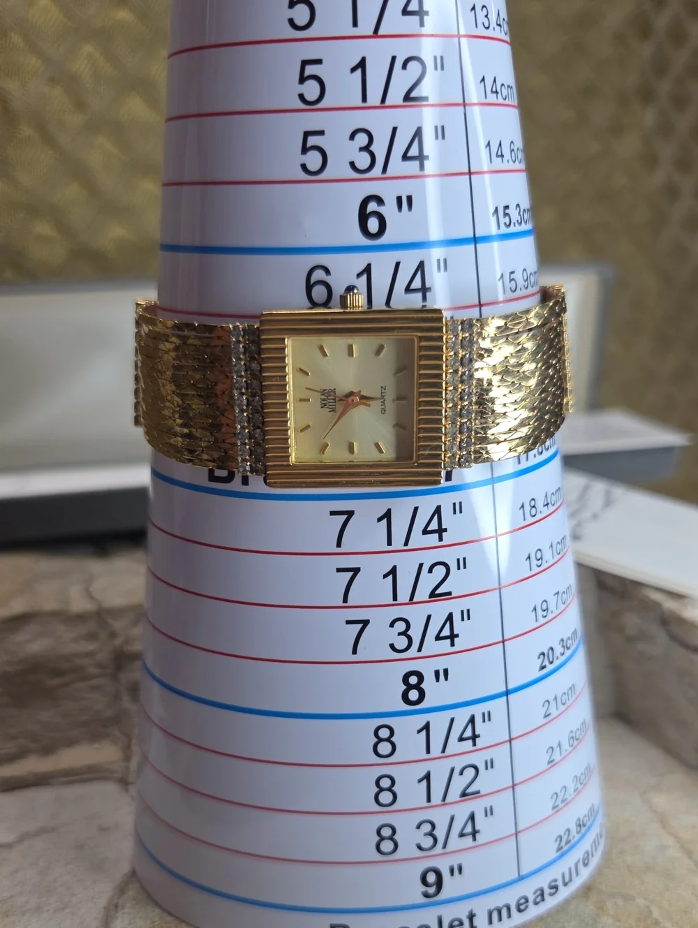 Nolan Miller Gold Chain Bracelet Watch  Rhinestone Accents Blue Sapphire Crown